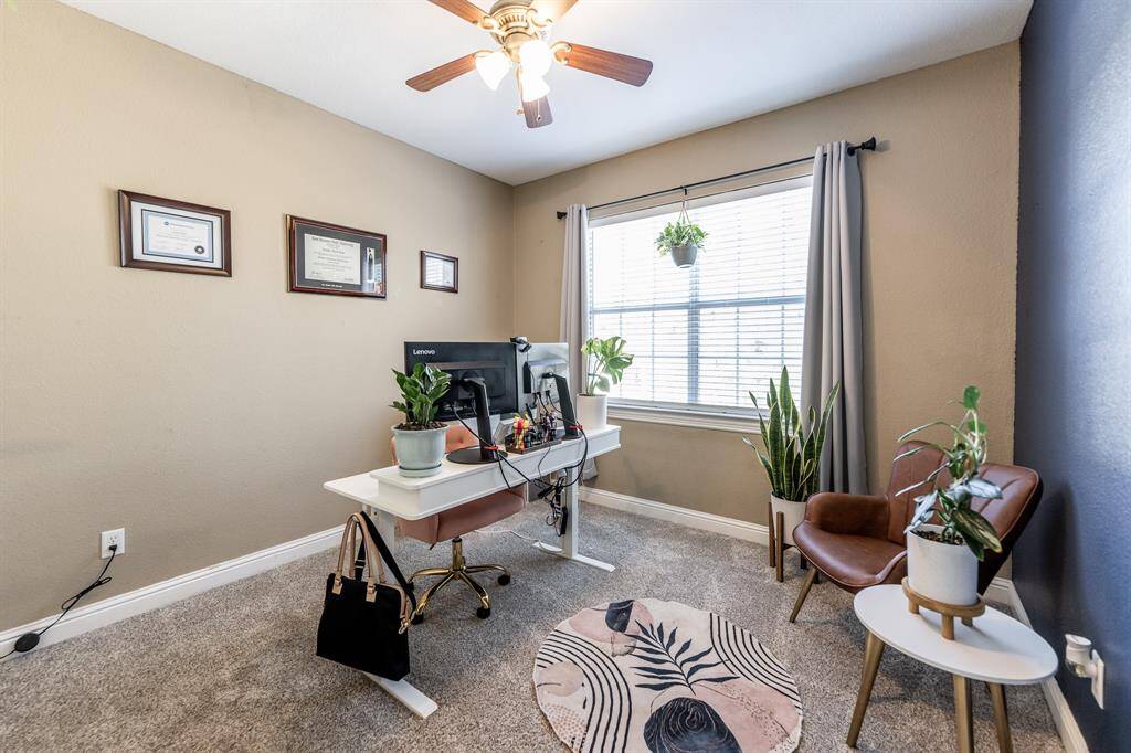 Bright, comfortable, and full of potential—this room works great as a bedroom, hobby space, or chill zone with extra style.