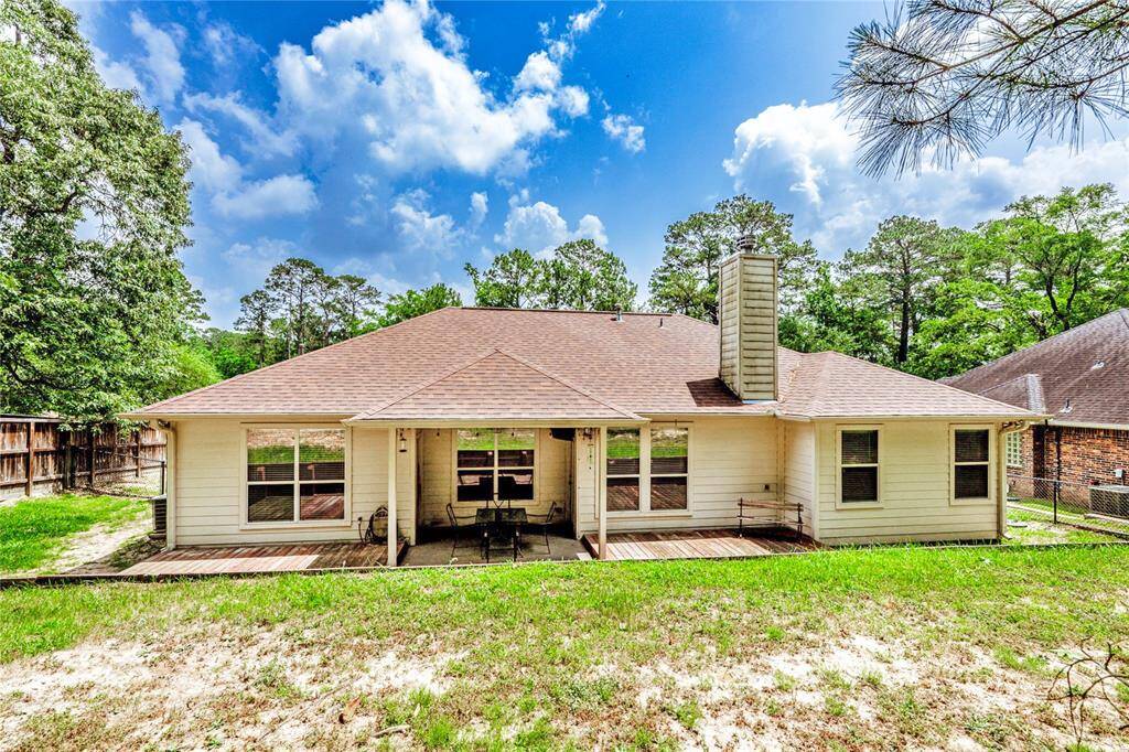 Surrounded by trees and full of potential, this peaceful backyard offers space to play, relax, and make the most of your time outdoors—no rear neighbors in sight.