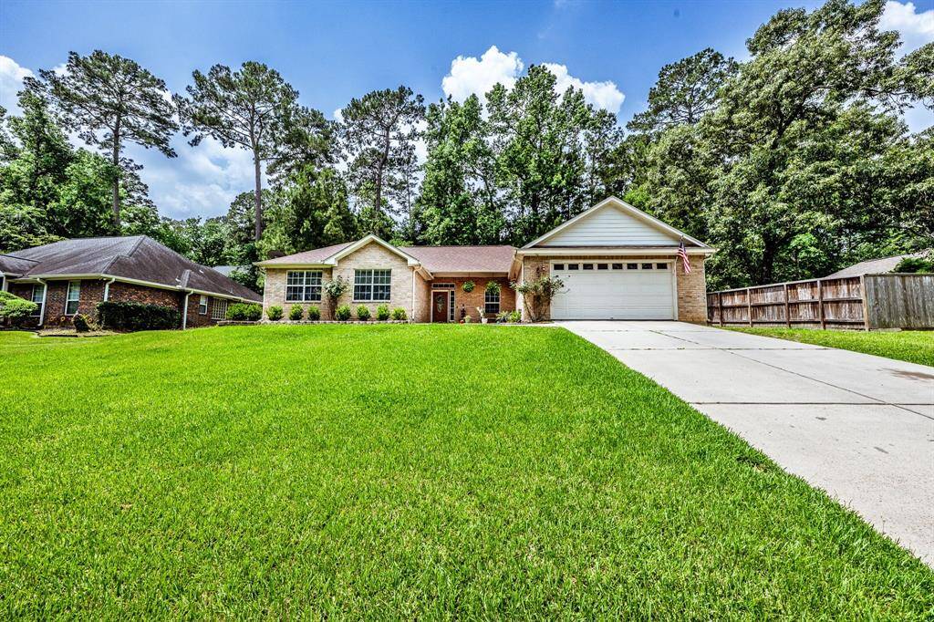 From the lush front lawn to the peaceful, tree-lined setting, this home brings the space, the charm, and the welcome-home feel from the very first glance.