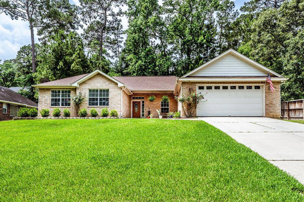 Picture-perfect from the street with a wide driveway, tidy landscaping, and brick charm—this high-and-dry home is ready to impress from the very first look.