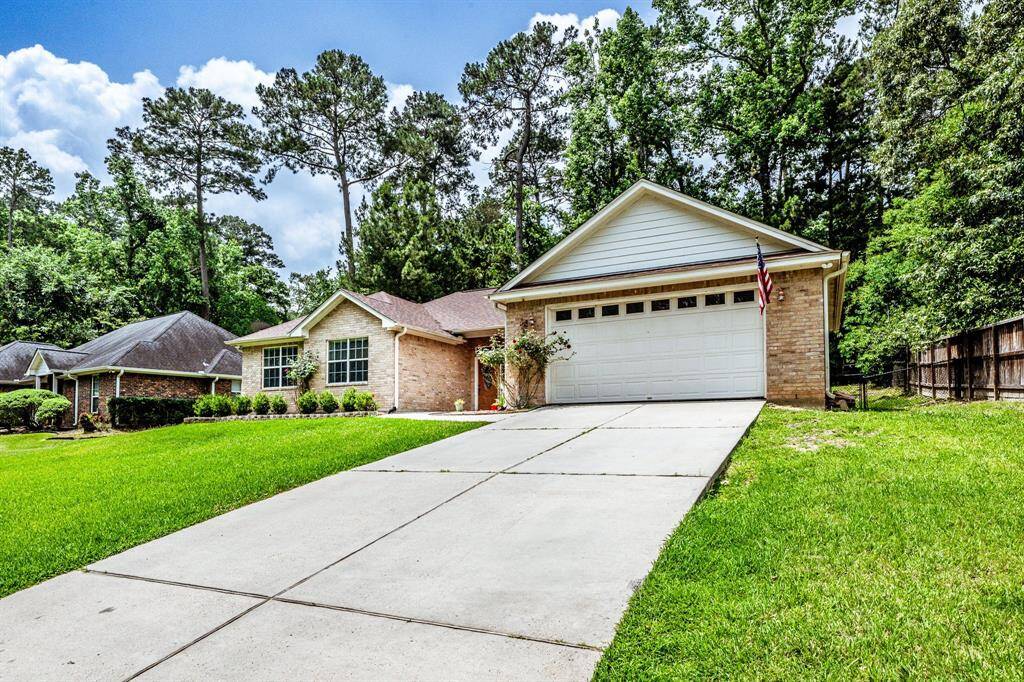 Set back with a long, clean driveway and surrounded by trees, this home gives you a grand welcome and plenty of room to pull in, stretch out, and settle in.