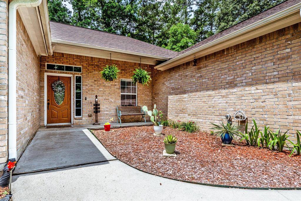From the clean lines to the hanging plants, this front porch brings all the welcome-home charm—just add a doormat and your favorite rocking chair.