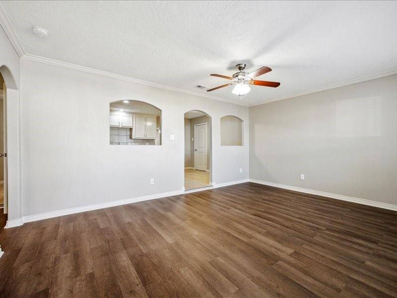 Freshly painted walls and new waterproof vinyl plank flooring create a clean, modern feel throughout.