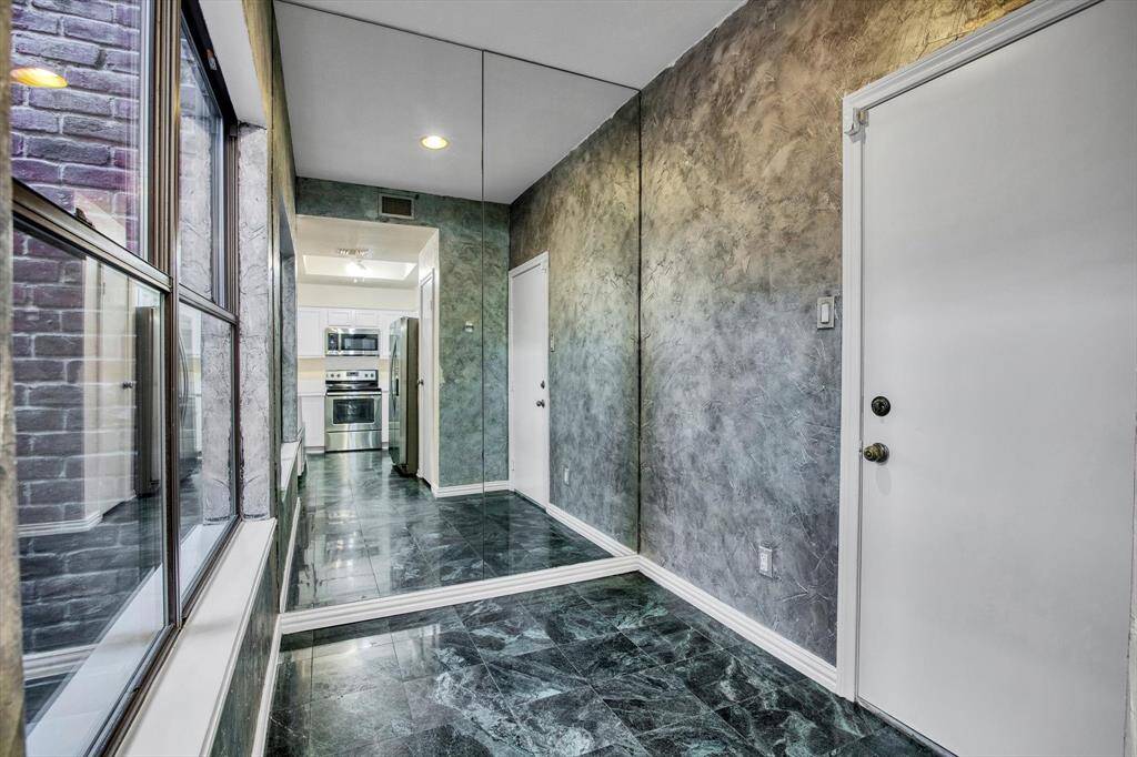 Breakfast nook off the kitchen with door from the garage