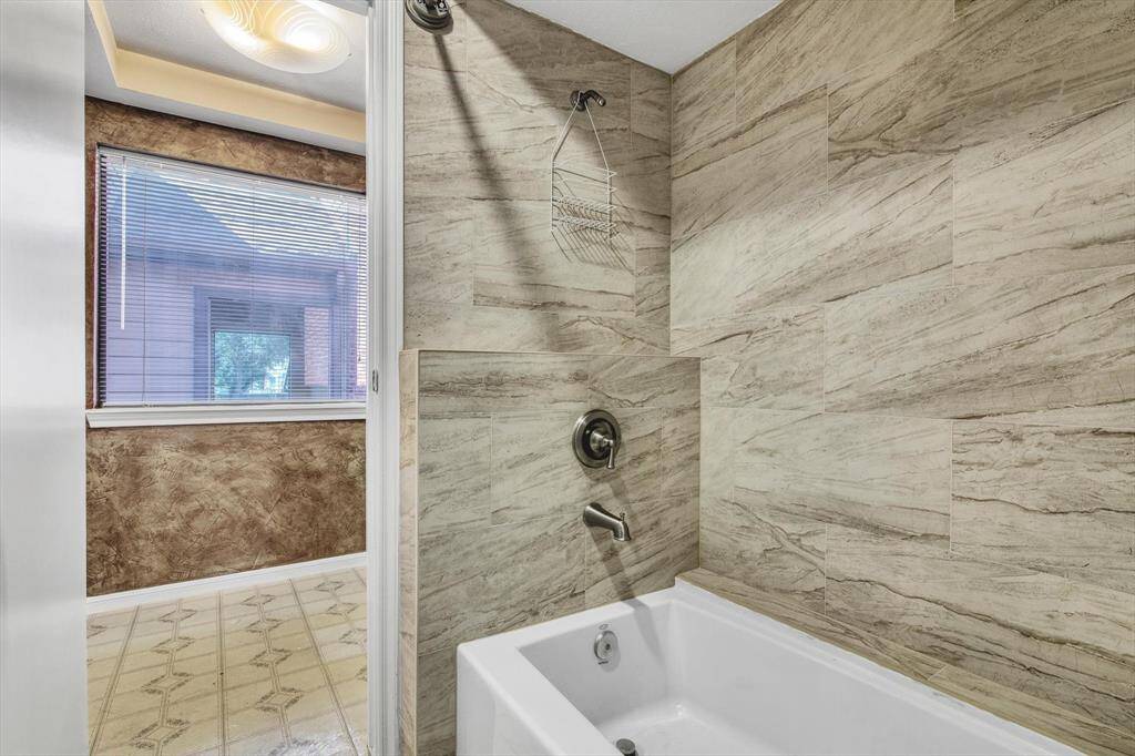 Recently updated tub and surround with new faucets
