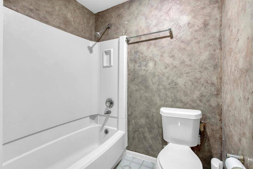 Bedroom two bath. New toilet