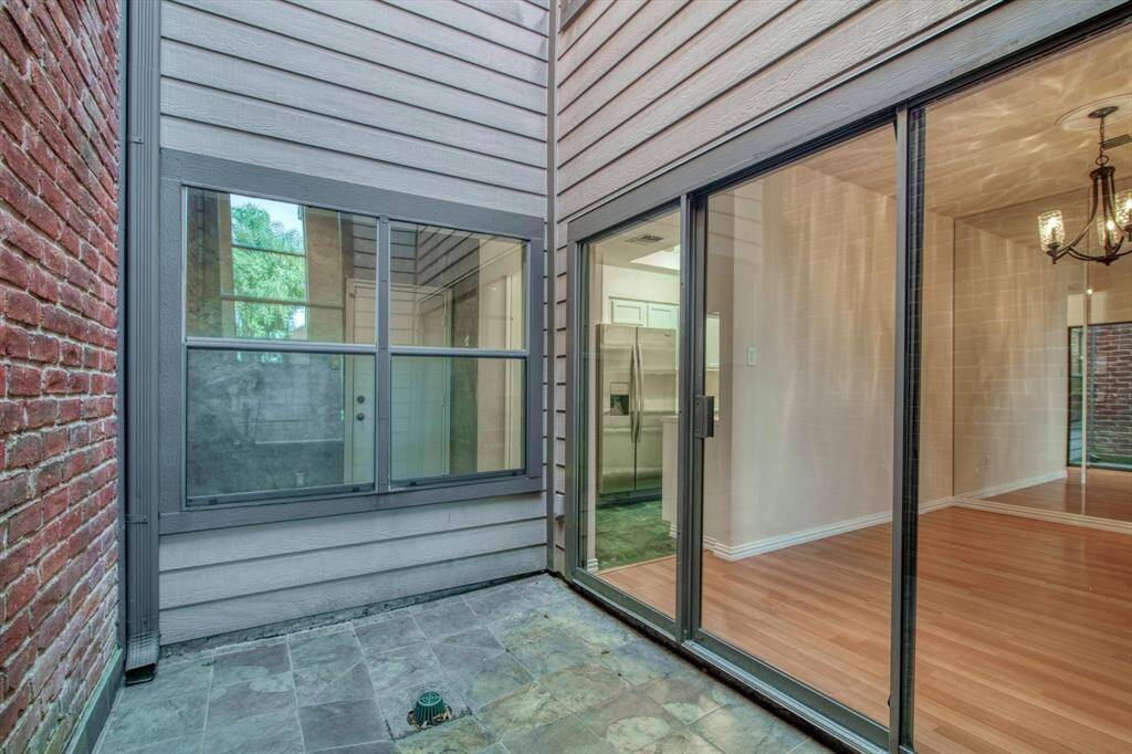 Another view from the atrium into kitchen, dining, and breakfast nook