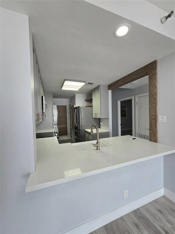 Eye-catching details like the rough cedar door trim add character and charm, setting this unit apart with a unique, custom feel.