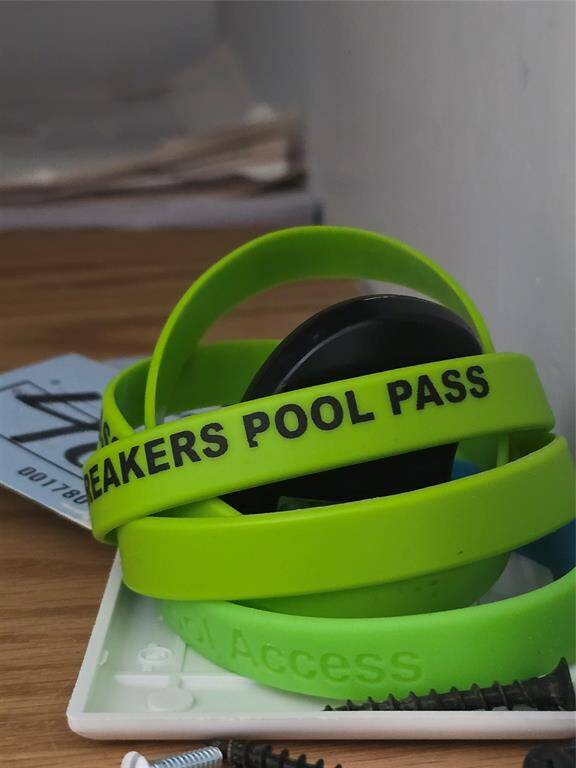 Pool pass bracelets - there are no additional fees for the residents to enjoy the amenities at The Breakers.