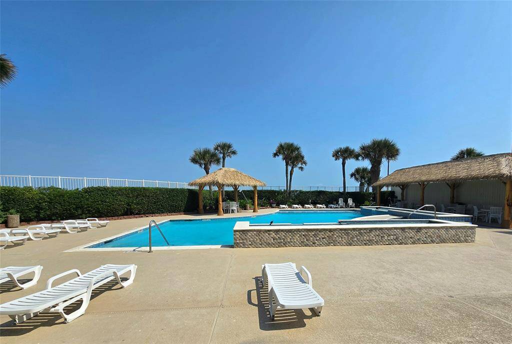 resort style pool with paplapa covered cooking and picnic area open to residents free of charge.