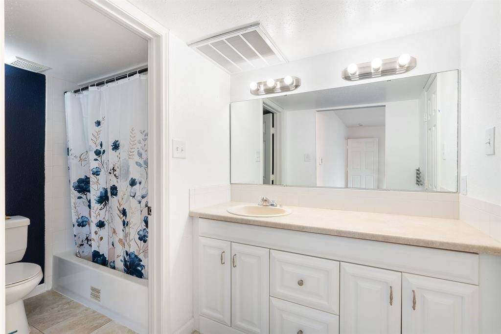 Enjoy extensive counter space for your items, and a freshly painted bathroom!