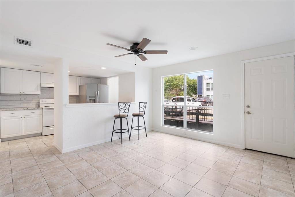 Bright and airy, this breakfast room has large windows and an abundance of natural light!