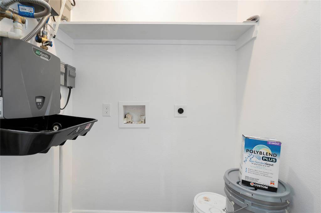 Efficient utility closet equipped for all your essential needs, offering convenience and organization in one space.