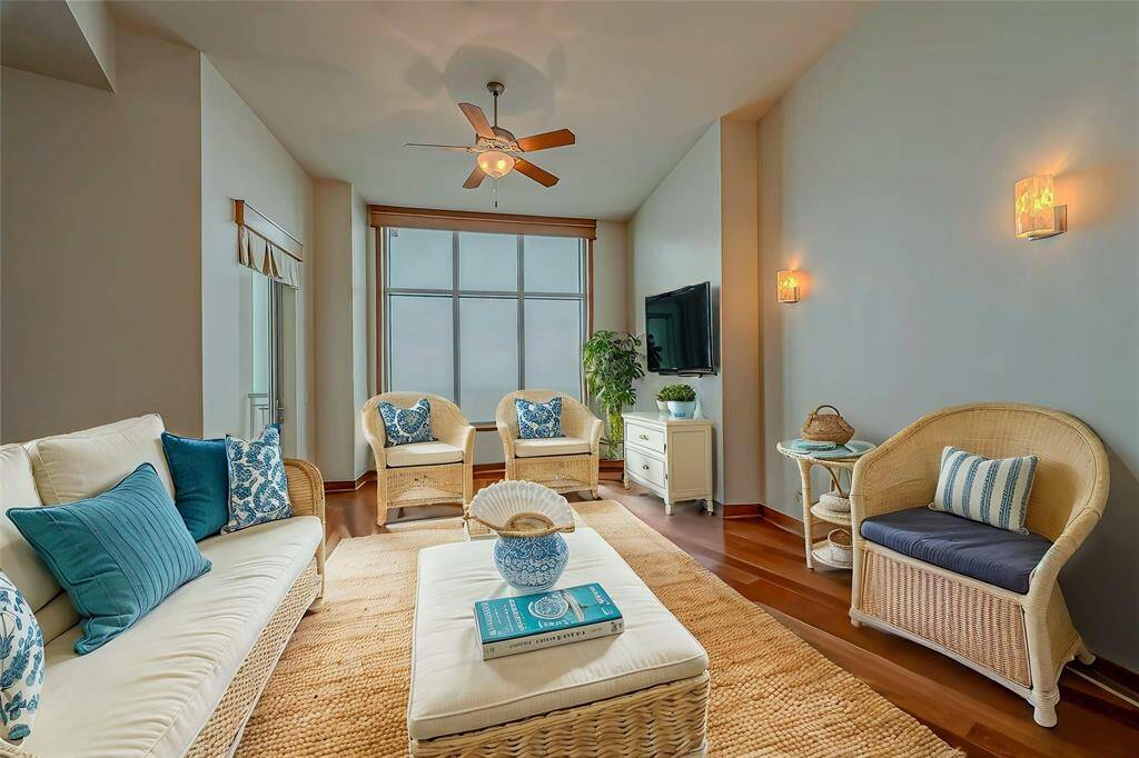 Ideal for entertaining, this versatile space can serve as a game room, bar area, or office.