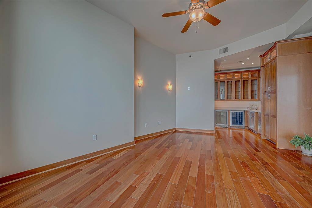 Enjoy entertaining in a dedicated bar area with private balcony access and stunning beach views.
