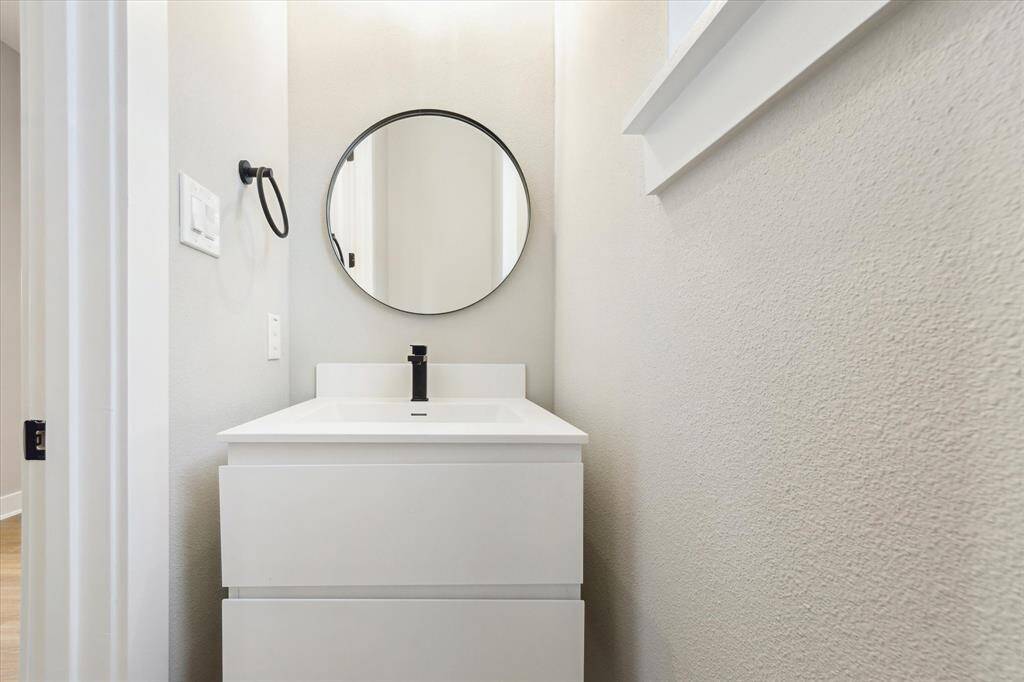 Powder bath adjacent to kitchen