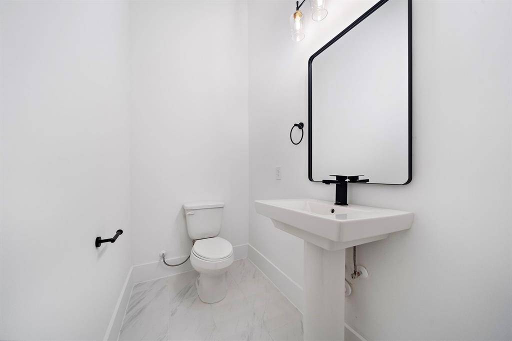 First-floor powder room. (Photo is of a previously completed home.)
