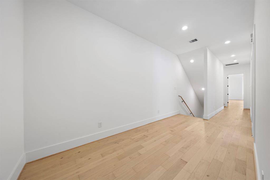Second-floor landing area large enough to accommodate a desk! (Photo is of a previously completed home.)