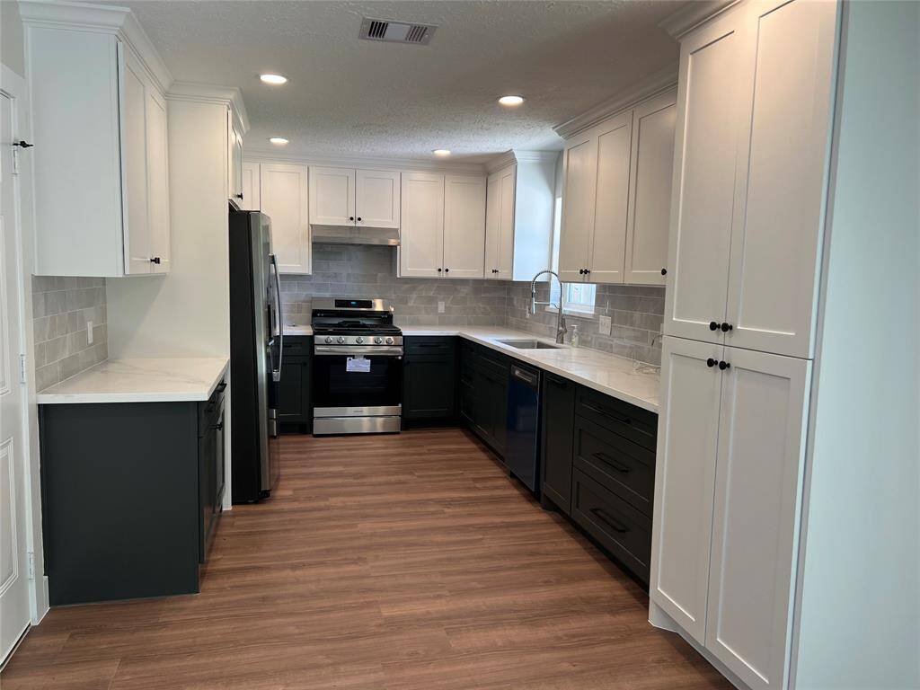 New cabinets, soft close cabinets, new appliances, new sink