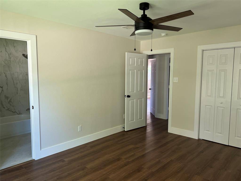 The entire home features new flooring, freshly painted walls, updated ceilings fans