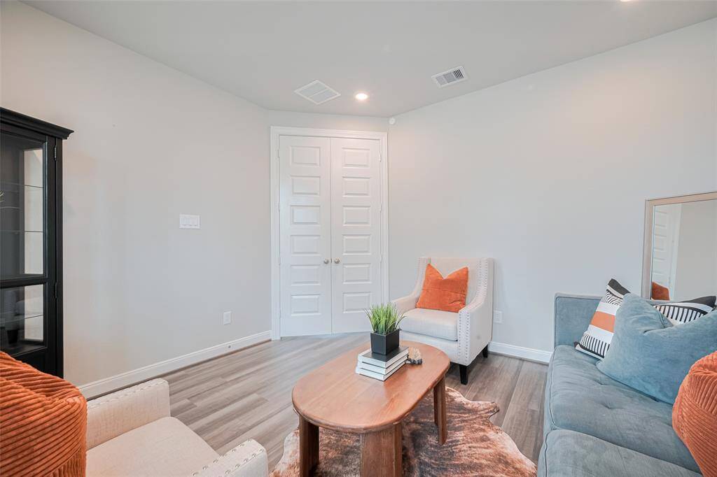 This inviting living room provides ample natural light and privacy.