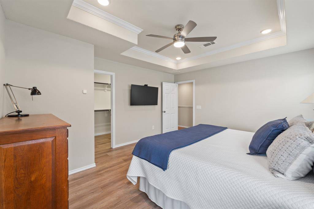 Generously sized with a clean layout and private en-suite access, offering flexibility for furniture or media setup.