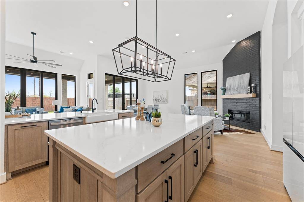 Seamlessly open to the living and dining areas, keeping everyone connected.