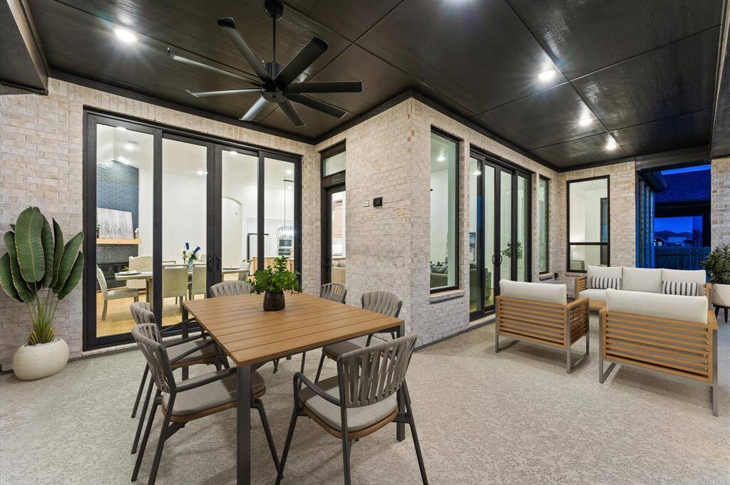 A peaceful retreat with a covered patio for morning coffee or evening chats. Equipped with a ceiling fan to keep you cool on warm days, offering year-round enjoyment.