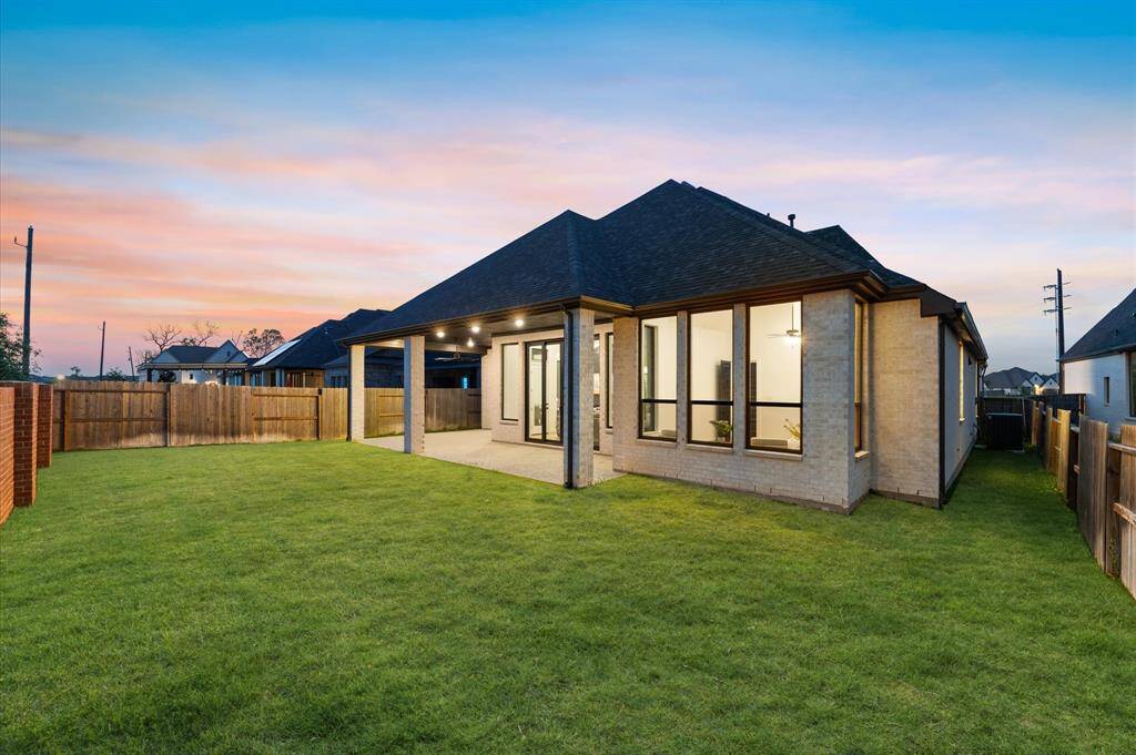 Whether you’re watching the sunset or enjoying a morning coffee, this backyard is a place where love and laughter grow.