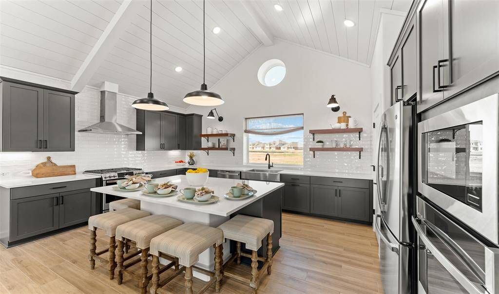 Stylish island kitchen (*Photo not of actual home and used for illustration purposes only.)
