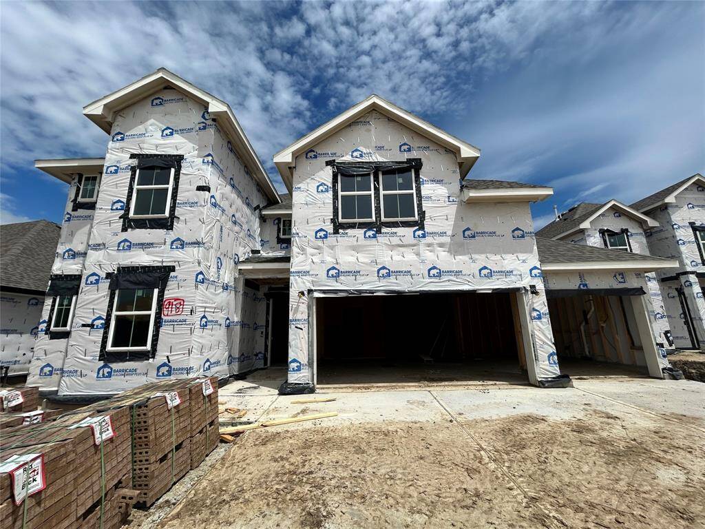 Two story home with 5 bedrooms, 4.5 baths, and 3 car garage.