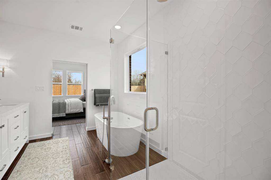 Freestanding tub and shower in primary bath (*Photo not of actual home and used for illustration purposes only.)