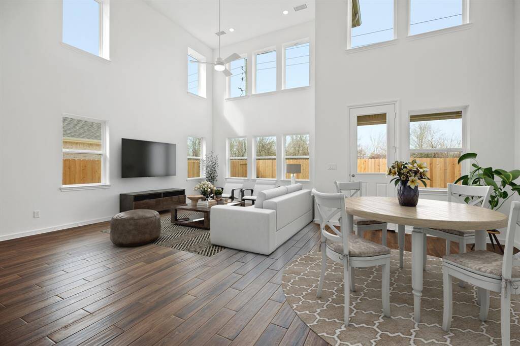 Bright open great room and dining area (*Photo not of actual home and used for illustration purposes only.)