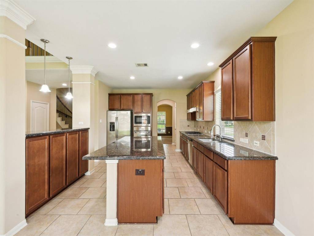So much granite counter space that the chef in the home will be happy!