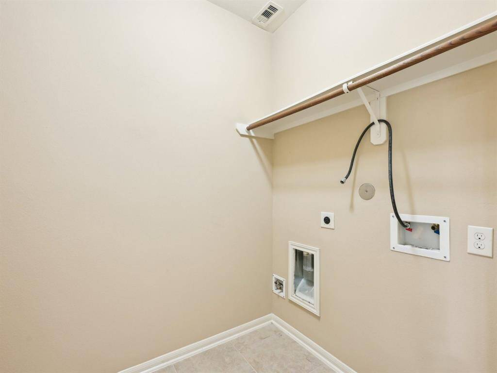The downstairs Laundry Room is spacious.