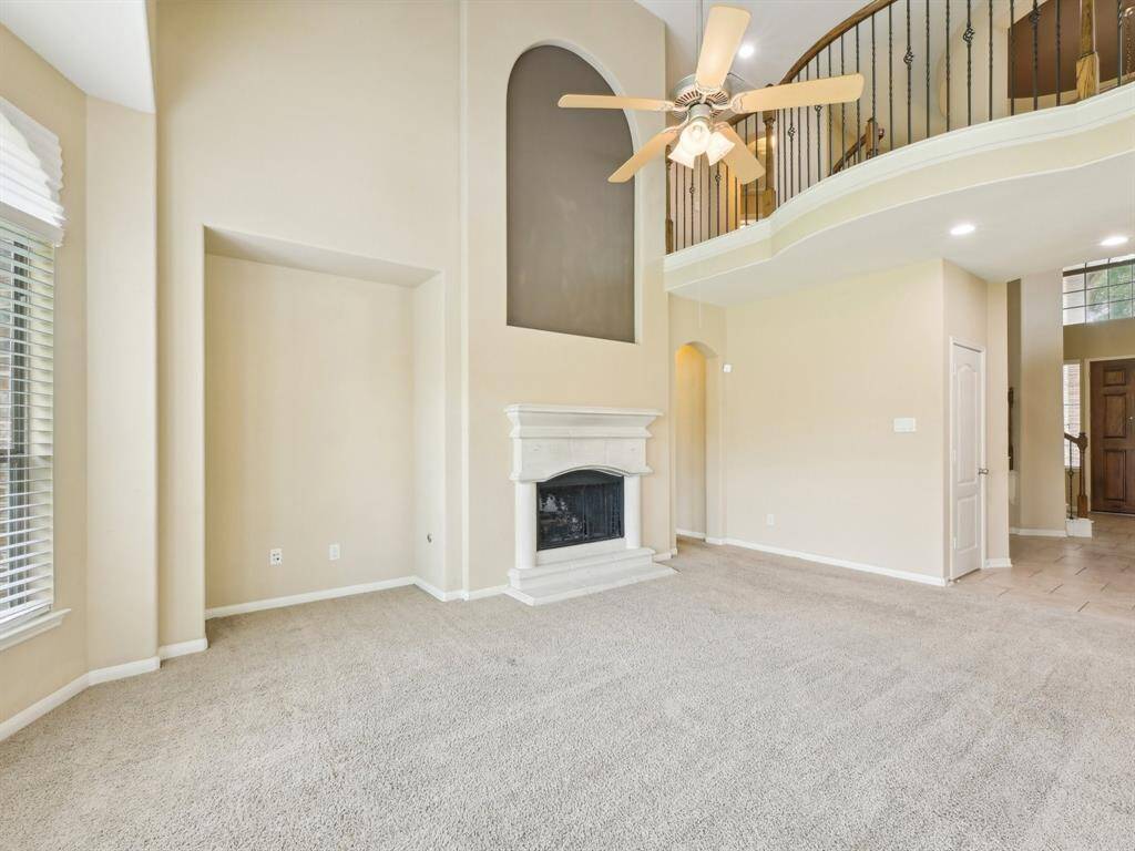 The cast stone fireplace is terrific for adding warmth or simply setting the mood for a relaxing evening.