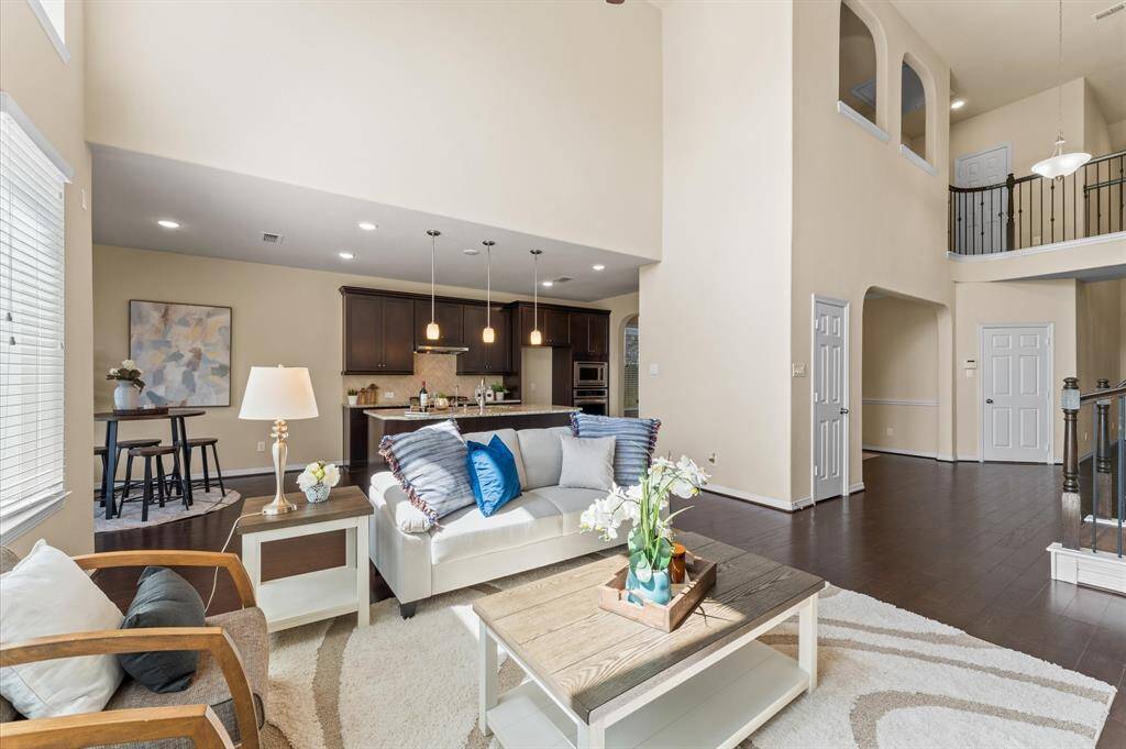 The connection to the kitchen allows everyone to stay part of the moment.