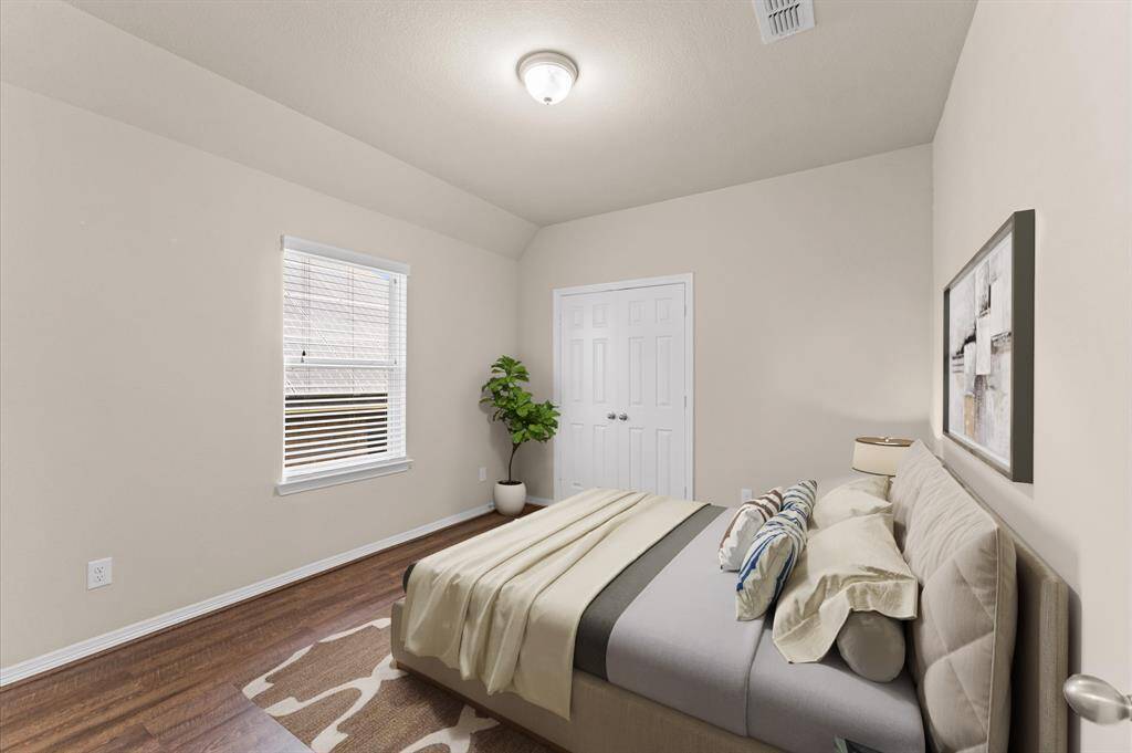 Set apart from the others, this spacious fifth bedroom offers privacy and peace. A quiet retreat that blends comfort with independence.