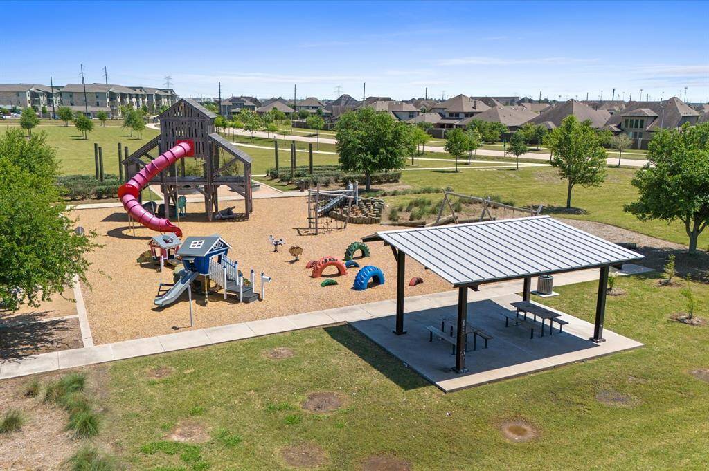 Benches offer a relaxing place for parents to unwind while keeping a watchful eye.