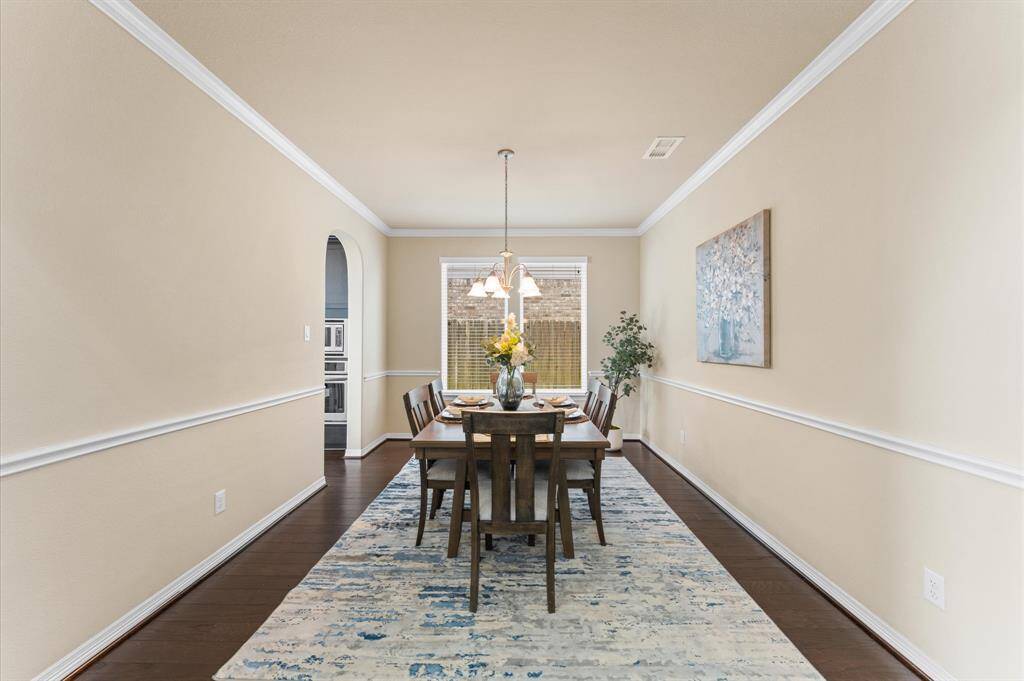 The flow from dining to kitchen makes entertaining effortless.