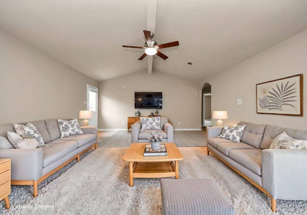 Virtually staged living room to show design options.