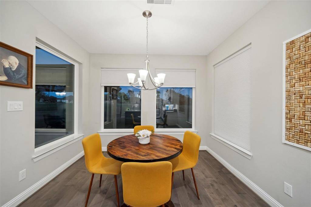 Imagine starting your day here—enjoying breakfast in a peaceful nook filled with sunshine and warmth, the perfect spot to plan your day or unwind with a book