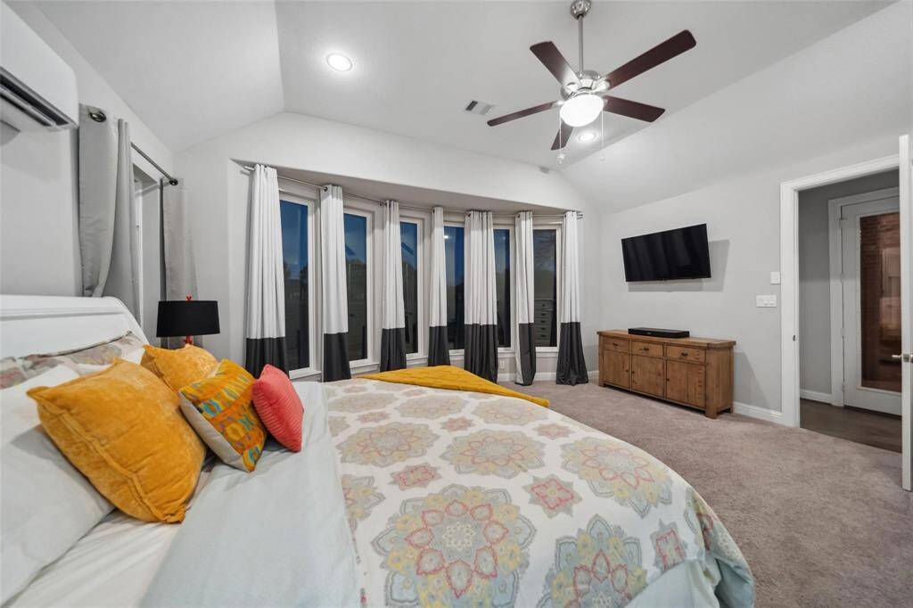 With ample space for a sitting area, the primary bedroom invites you to create your own personal sanctuary, combining luxury with everyday comfort.
