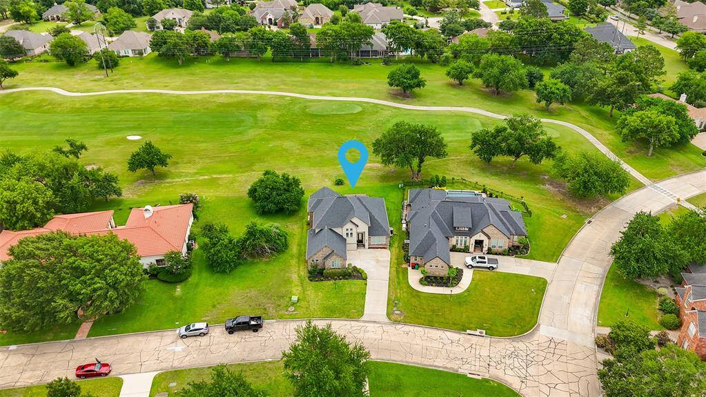 Nestled on a quiet street within a luxury neighborhood, this home sits right on the 3rd hole of the Weiskopf golf course, providing a serene setting that feels like your personal sanctuary.