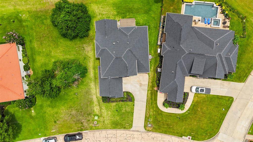 Take in the full scope of the property and surrounding community—showcasing the home’s perfect setting and beautiful neighborhood amenities.
