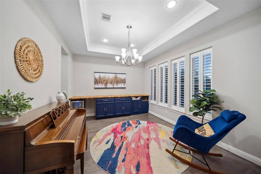 This expansive space offers flexibility to suit your lifestyle—whether you envision a piano room, sitting area, or additional dining space, the possibilities are as open as the room itself.