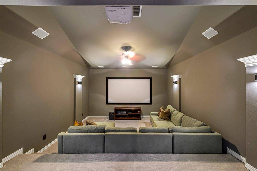 Imagine watching your favorite team or an amazing movie in this fantastic media room.  The current owners have opted for a large "family size" sectional but you can do multi level theater seating as well.  The options are endless with this large and comfortable space.  Media equipment stays with the home.