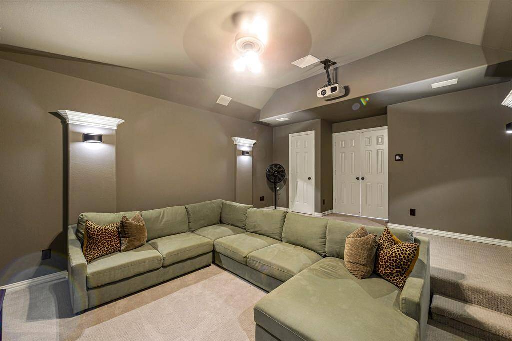 Another view of this very special and private media room complete with storage closet.