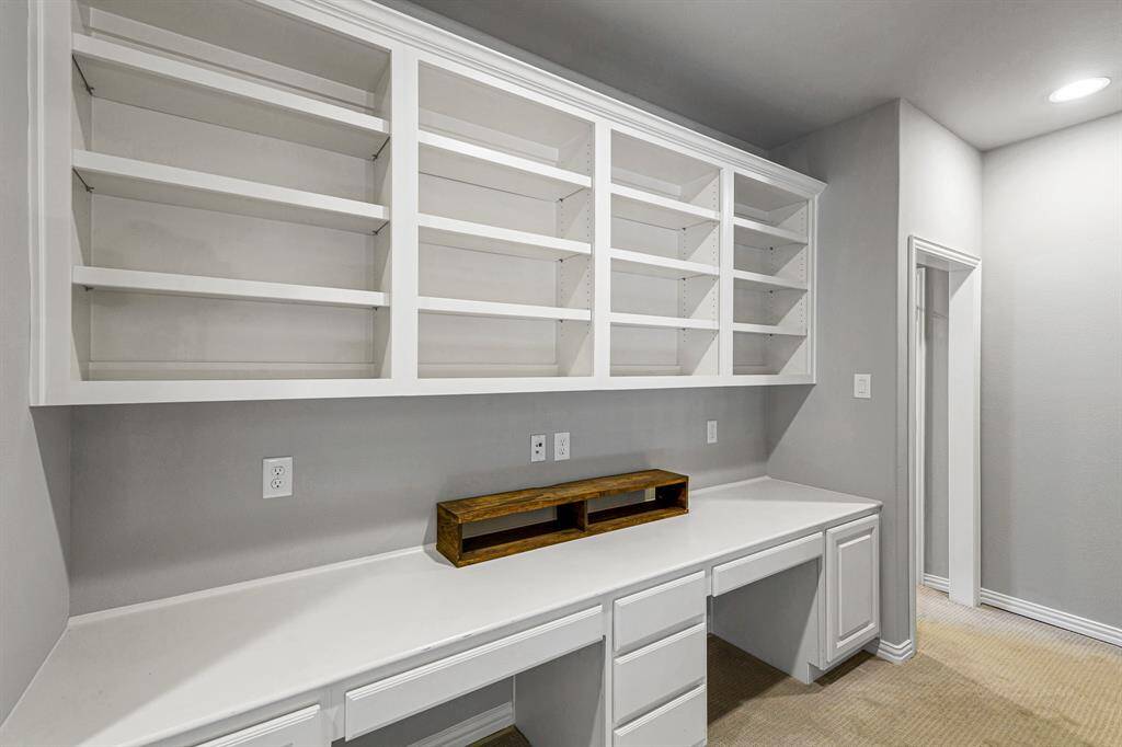 Perfect built in homework station for the kids.  Storage above and below and lots of counter/desk space.