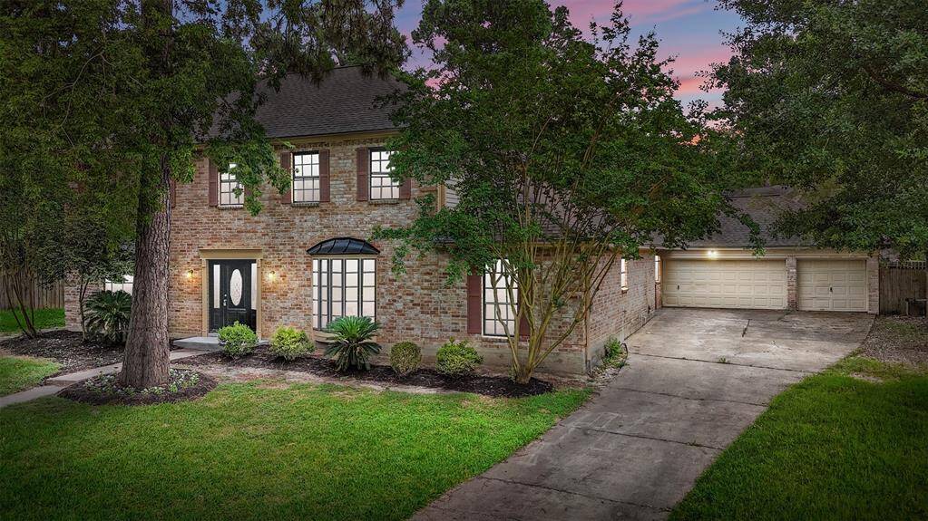 Nestled at the end of a cul-de-sac, this stately home makes a lasting first impression with its bay window and refurbished entry and front door. Mature trees and lush landscaping frame the home beautifully, while the spacious 3-car garage and extended driveway offer ample parking.